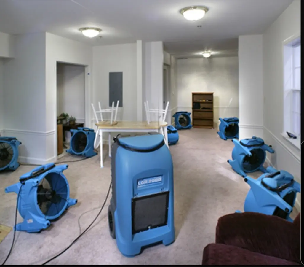 Air movers and dehumidifier setup for Water Damage Restoration in Tanaina
